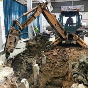 longitudinal machine pit construction