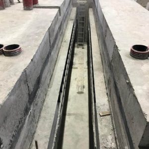longitudinal machine pit construction