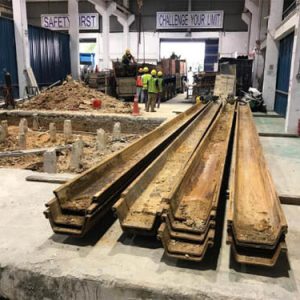 longitudinal machine pit construction