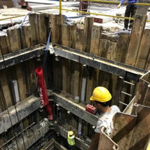 longitudinal machine pit construction