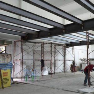 mezzanine i‑beams with bondek slab system