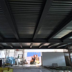 mezzanine i‑beams with bondek slab system